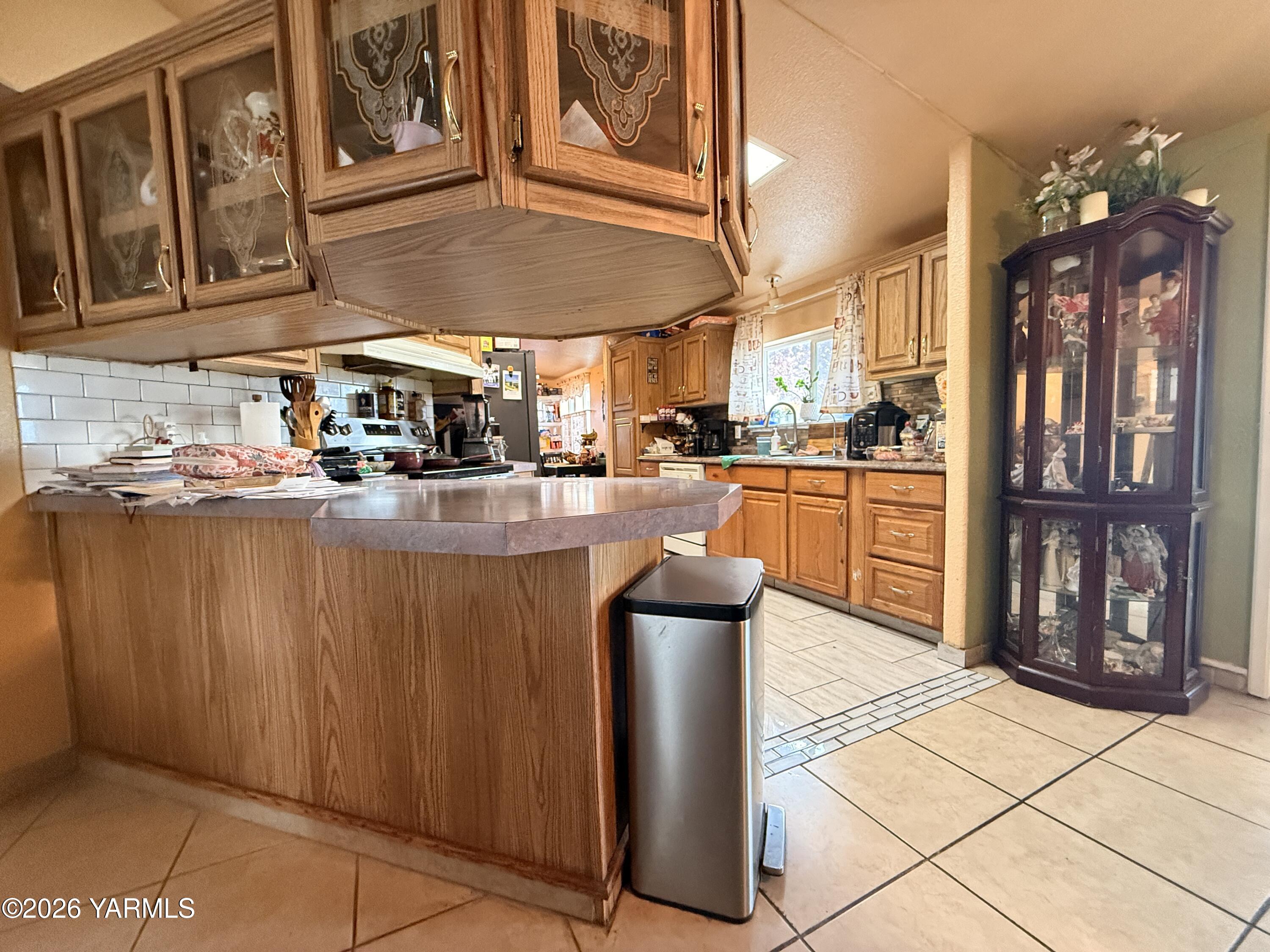 1051 County Line Mabton, WA 98935 - Photo 8 of 22 a kitchen with stainless steel appliances granite countertop a sink and cabinets