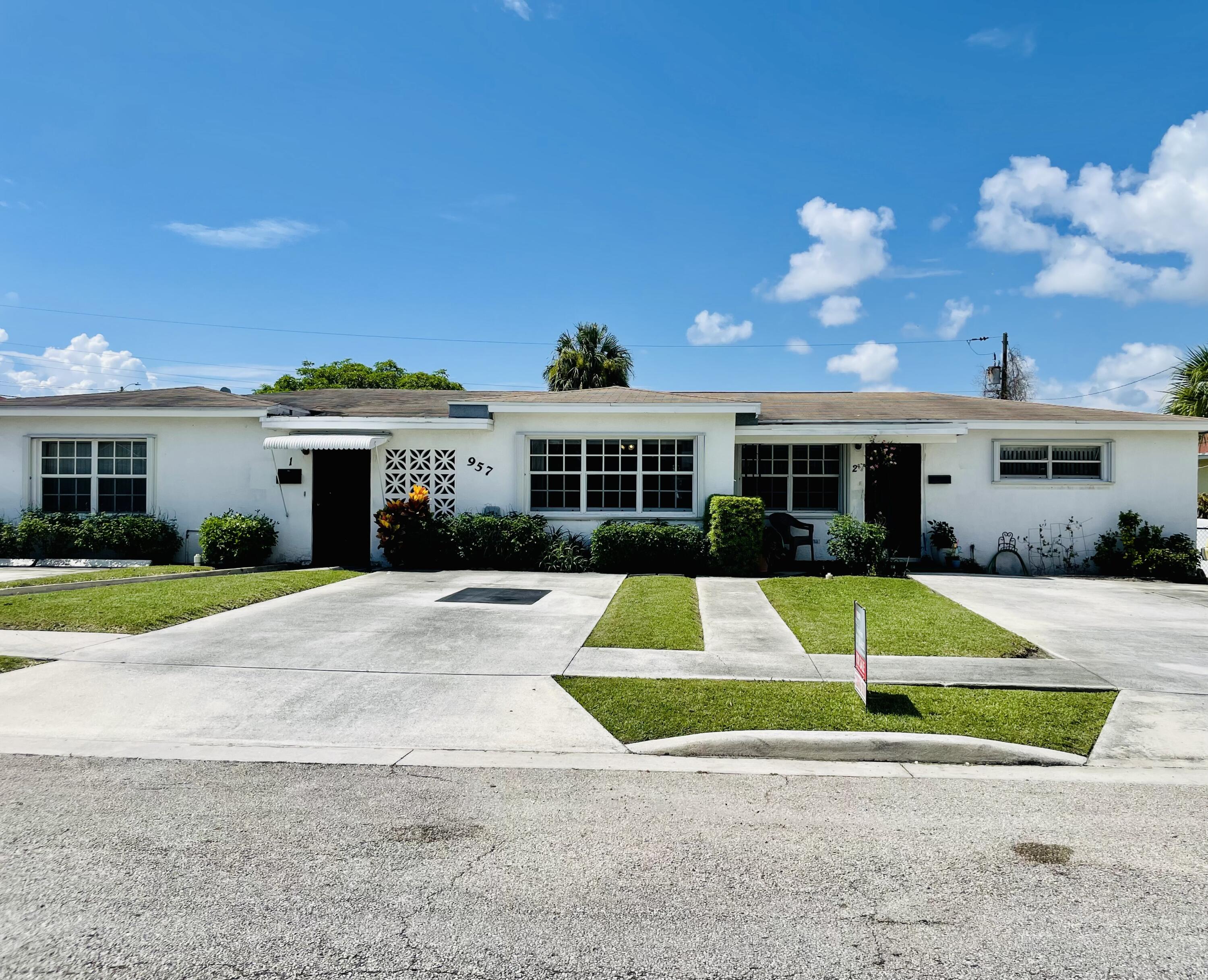 957 West 7th Street Riviera Beach, FL 33404 - Photo 1 of 30 Front