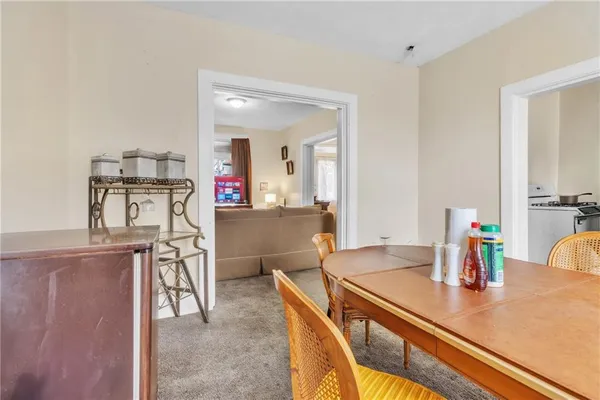 a kitchen with stainless steel appliances a sink and cabinets