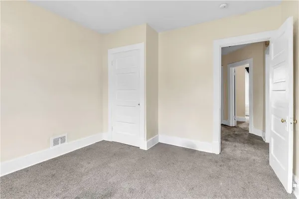 an empty room with closet