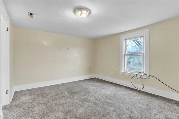 an empty room with a window