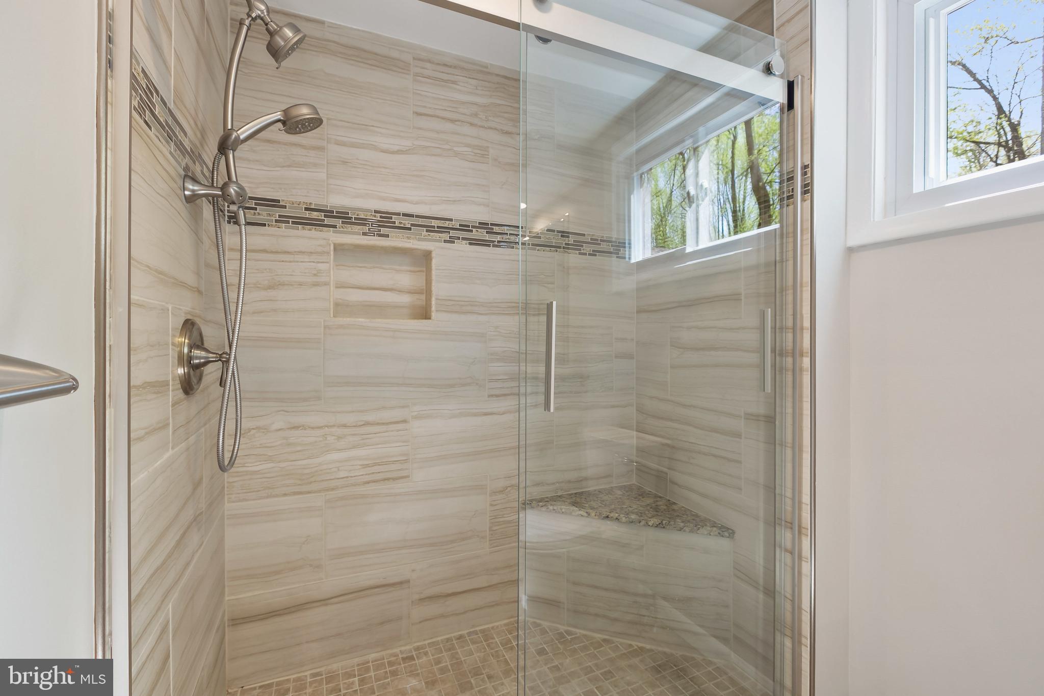 11019 Swansfield Road Columbia, MD 21044 - Photo 21 of 47 Beautiful tile shower, window, bright!