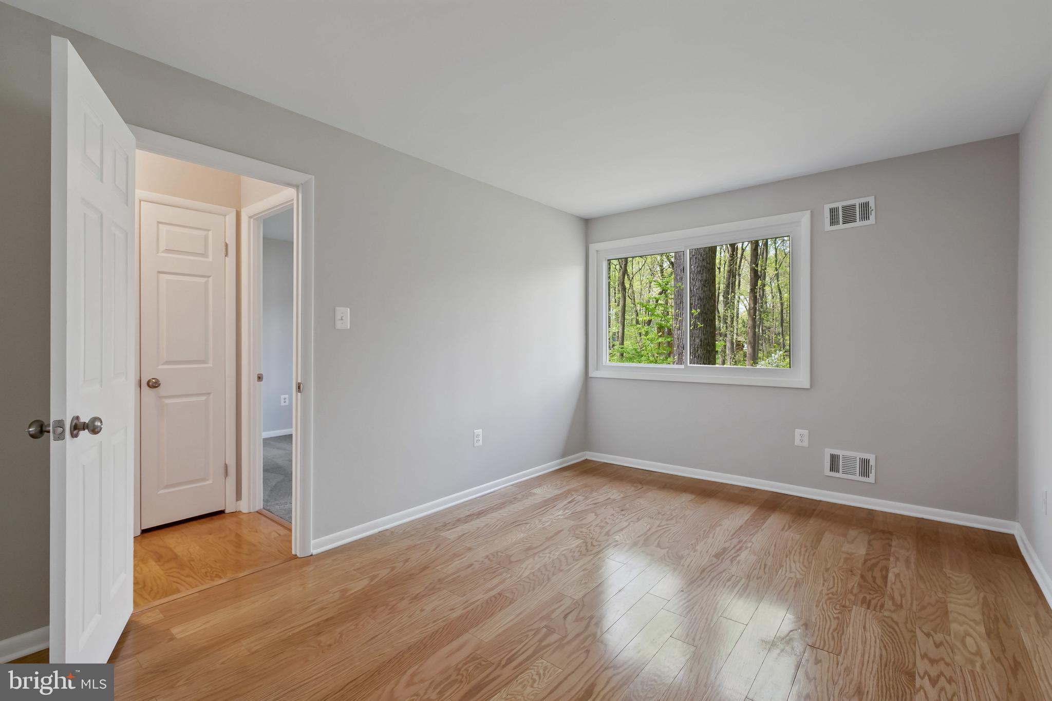 11019 Swansfield Road Columbia, MD 21044 - Photo 22 of 47 Bedroom II upper level; hardwood floor.
