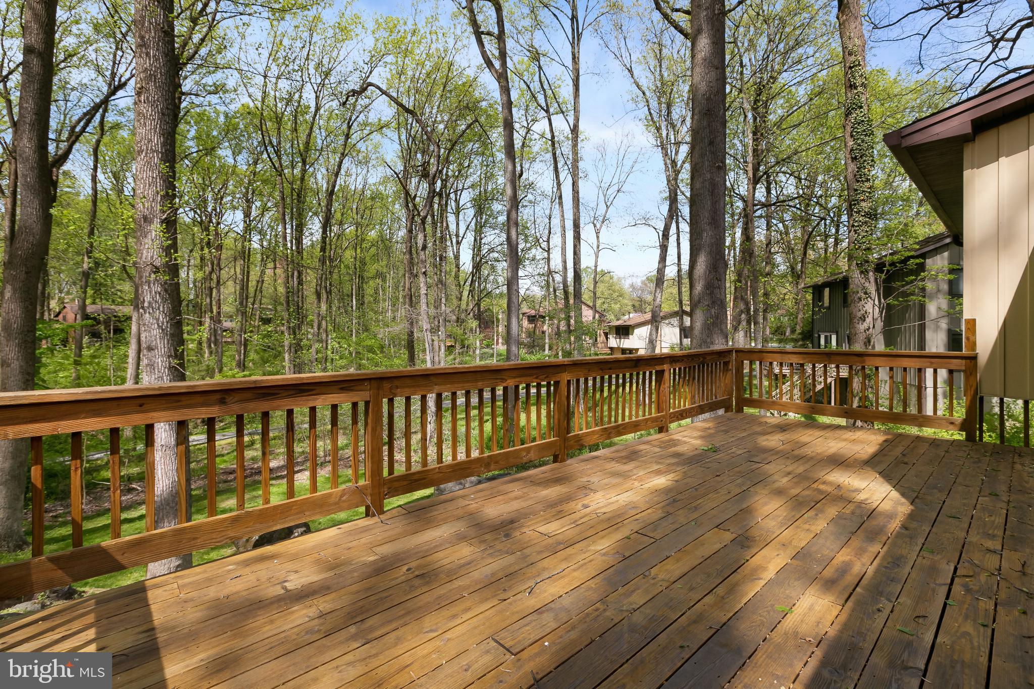 11019 Swansfield Road Columbia, MD 21044 - Photo 38 of 47 Massive wood deck; freshly stained!