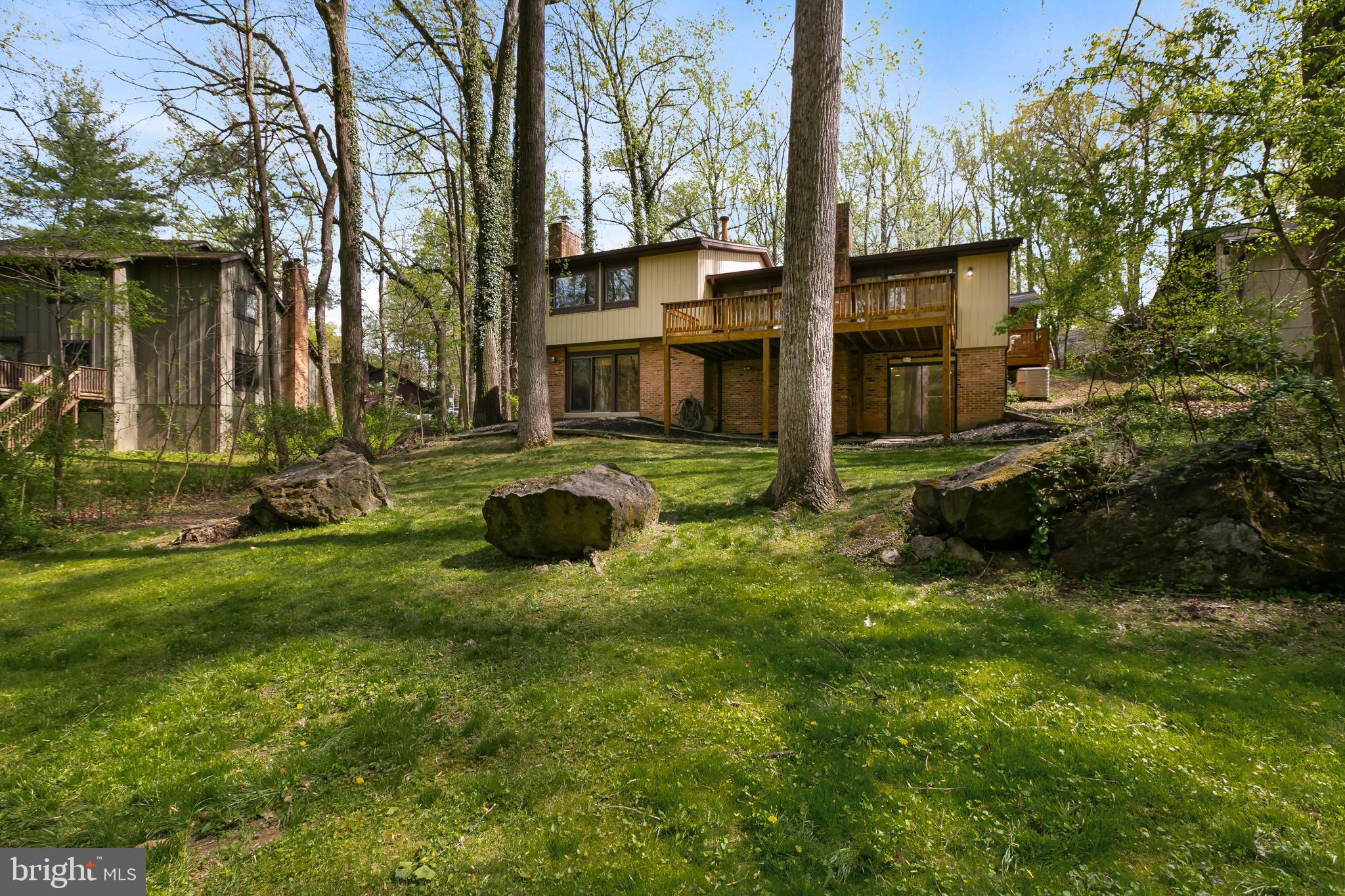 11019 Swansfield Road Columbia, MD 21044 - Photo 40 of 47 Spacious Columbia, MD backyard! Mature landscape.