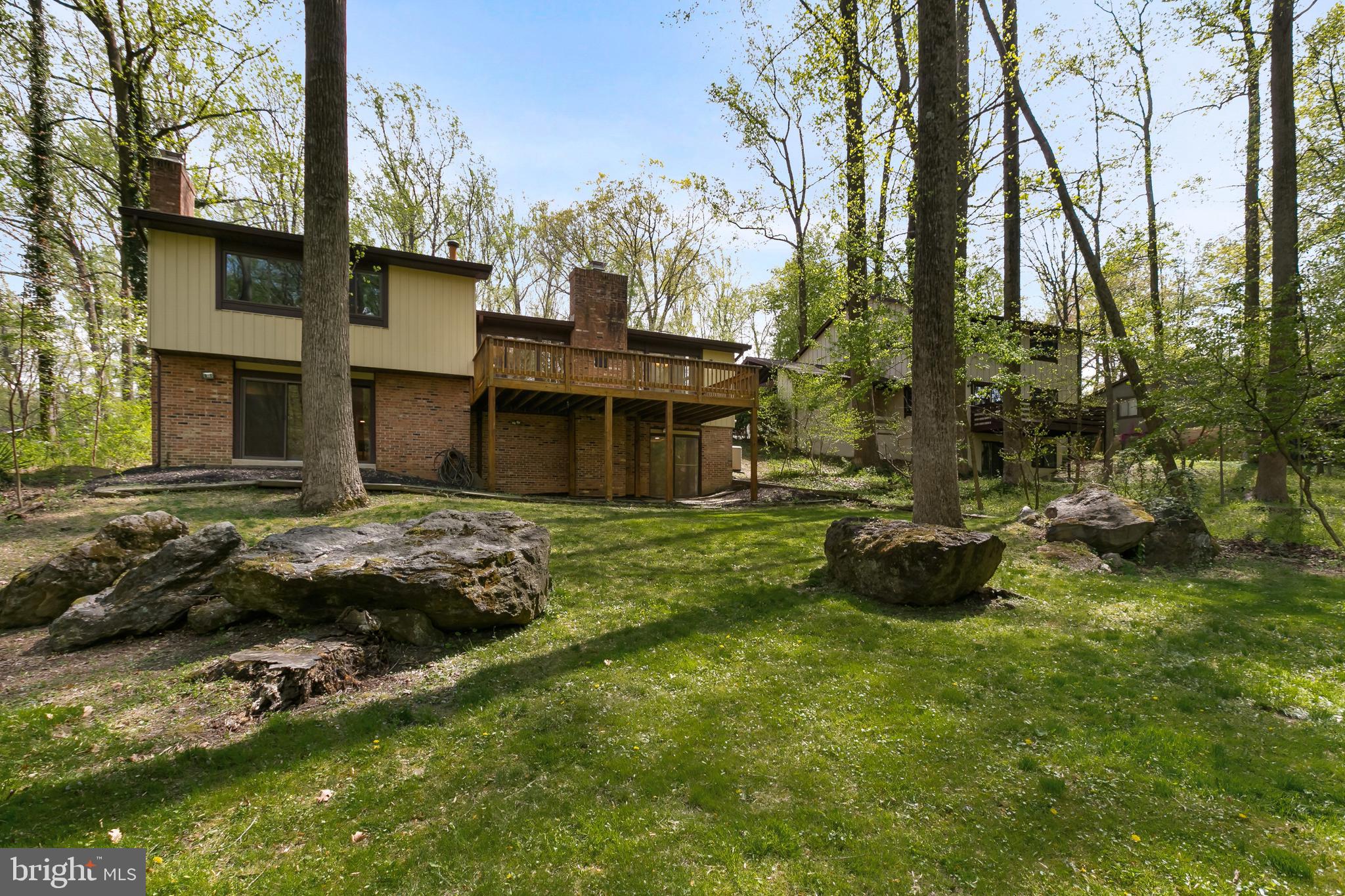 11019 Swansfield Road Columbia, MD 21044 - Photo 41 of 47 Spacious Columbia, MD backyard! Mature landscape.