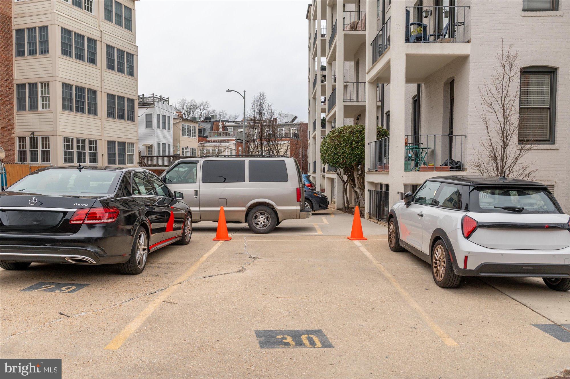 2230 California Street Northwest, Unit 4DW Washington, DC 20008 - Photo 34 of 43 a view of a cars park in front of a building