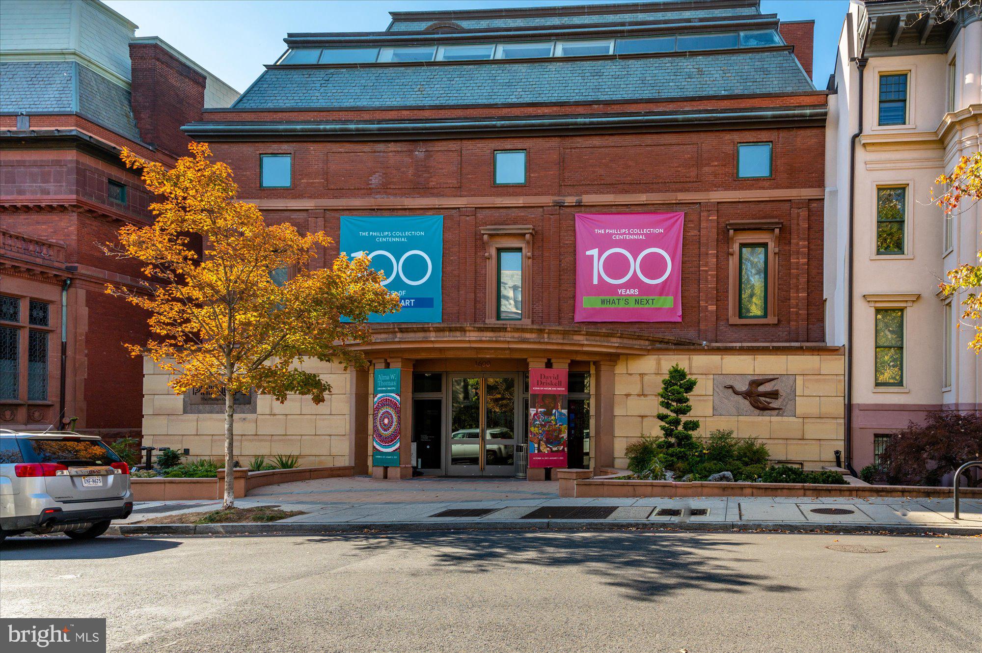 2230 California Street Northwest, Unit 4DW Washington, DC 20008 - Photo 41 of 43 a view of a building with a street sign on a road