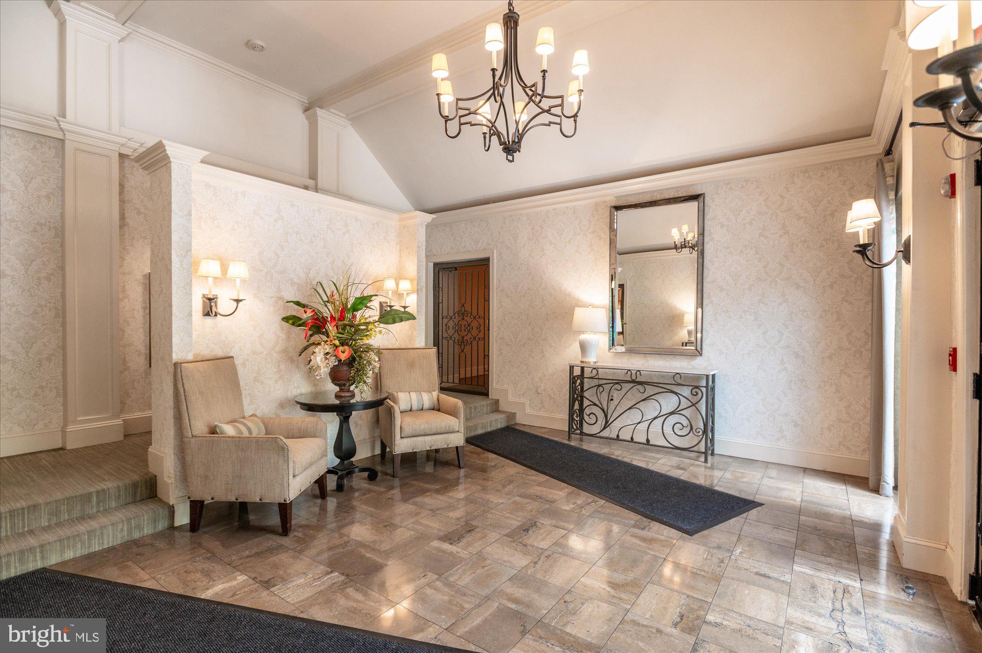 2230 California Street Northwest, Unit 4DW Washington, DC 20008 - Photo 5 of 43 a living room with furniture and a chandelier