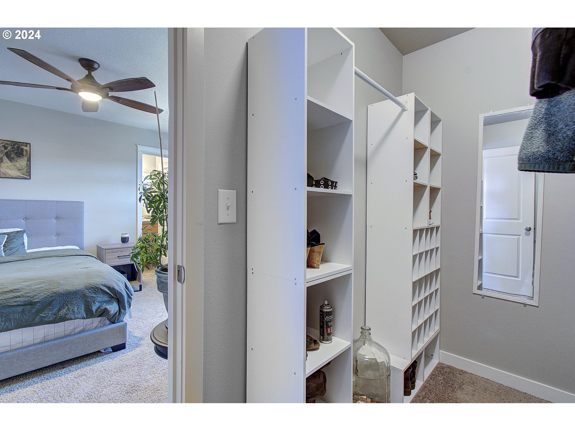 146 North 44th Place Ridgefield, WA 98642 - Photo 26 of 30 a bedroom with a bed and a book shelf