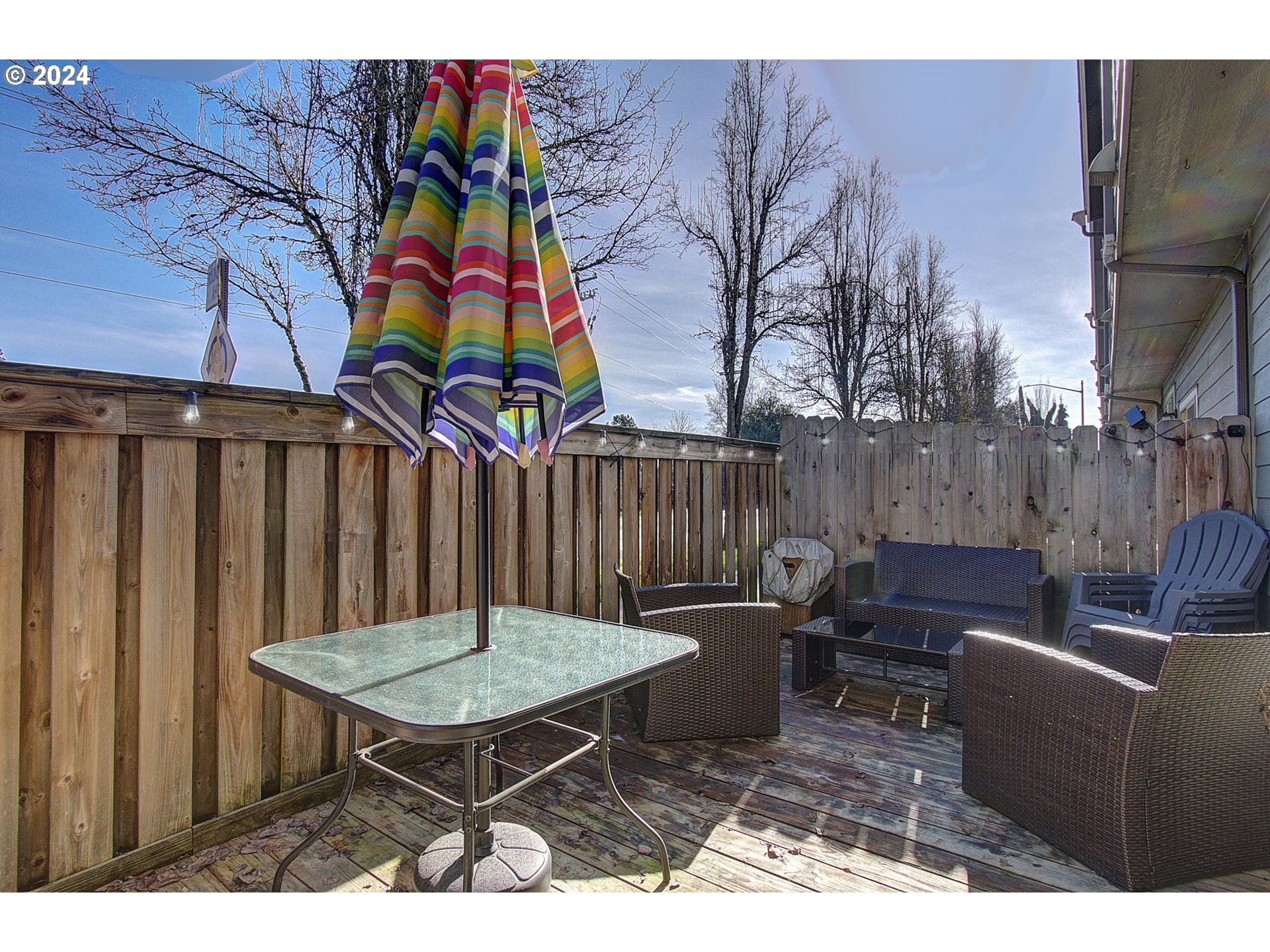 146 North 44th Place Ridgefield, WA 98642 - Photo 29 of 30 a view of a chairs and tables in the back yard of the house