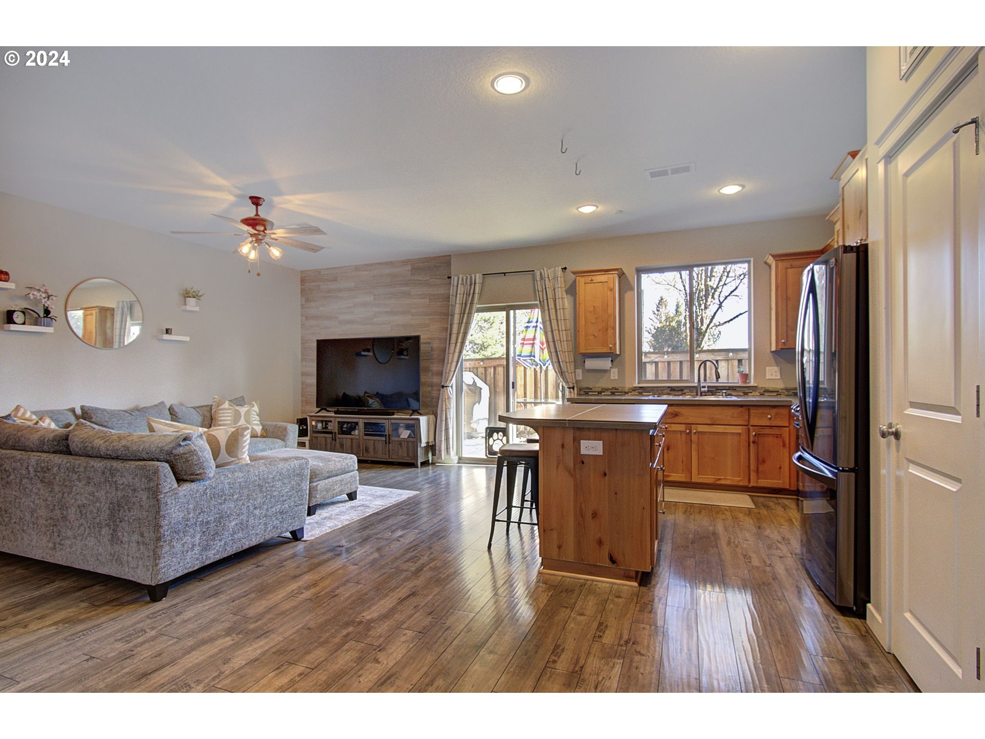 146 North 44th Place Ridgefield, WA 98642 - Photo 10 of 30 a living room with furniture and a fireplace
