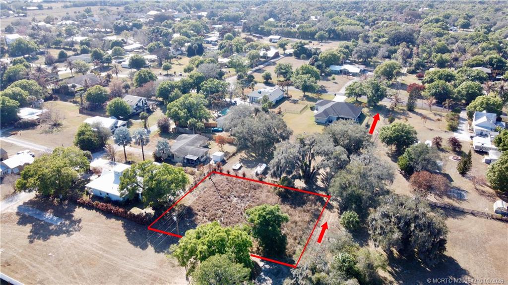 0 Gopher Ridge Road Fort Pierce, FL 34982 - Photo 2 of 4 an aerial view of a city and mountain