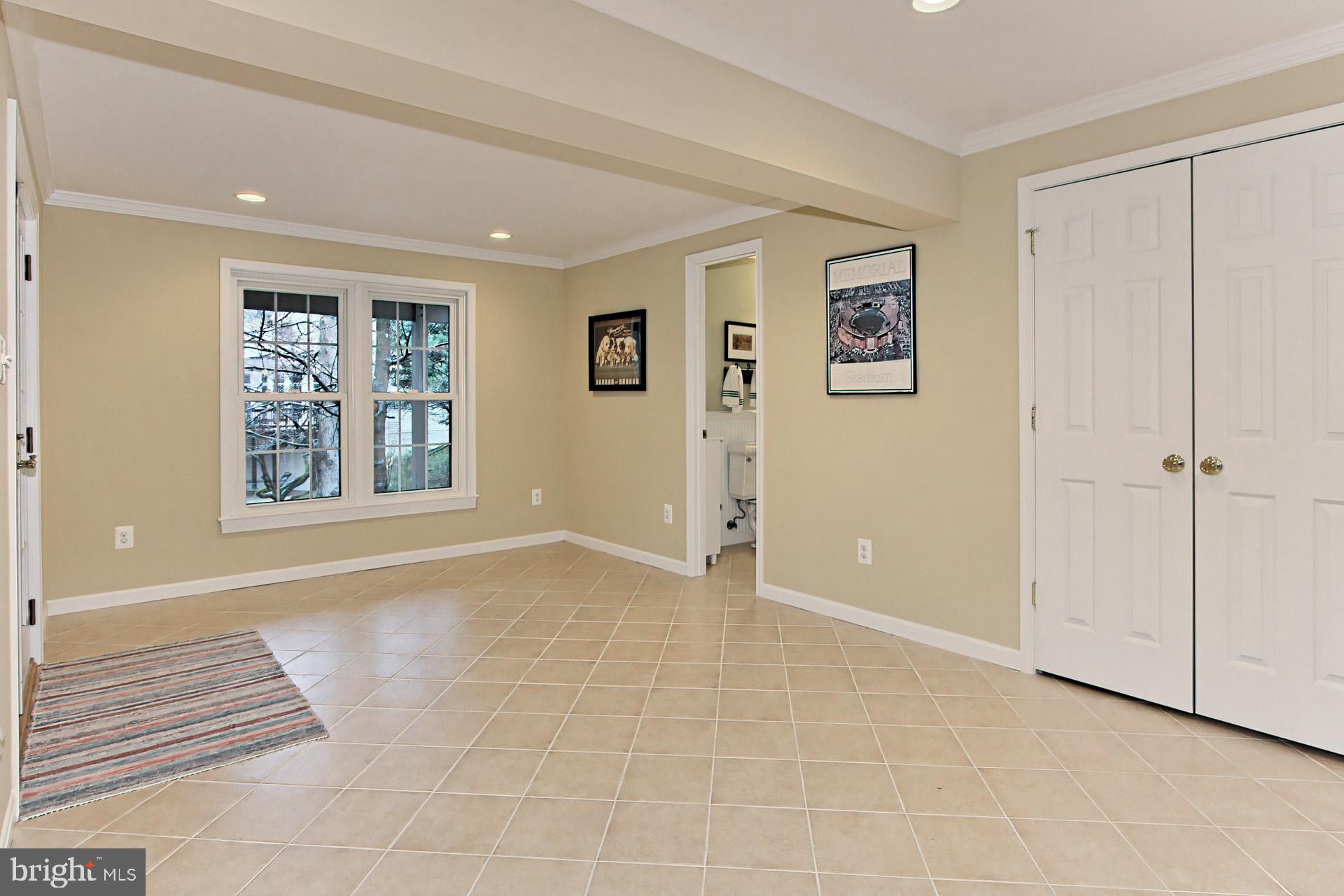 8126 Ridge Creek Way Springfield, VA 22153 - Photo 33 of 50 a view of an empty room with a window