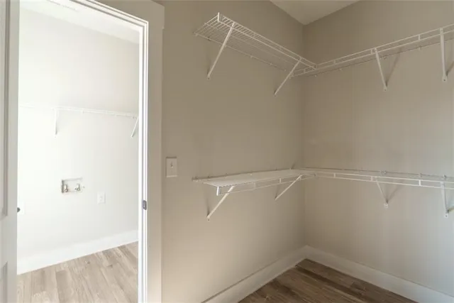 a view of an empty walk in closet