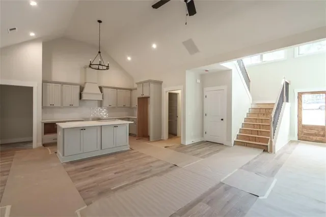 a view of a kitchen with a sink and a window