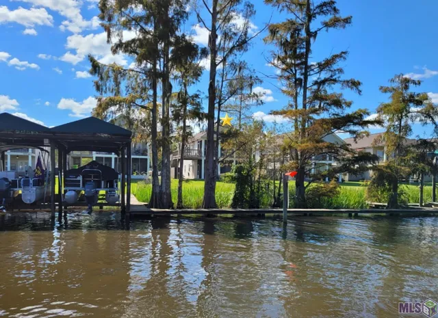 $244,500 | 11182 River Highlands Drive, Unit 4A, St. Amant, LA 70774