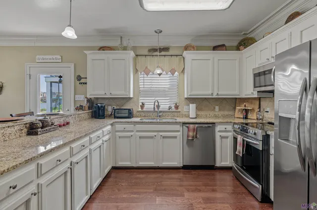 $244,500 | 11182 River Highlands Drive, Unit 4A, St. Amant, LA 70774