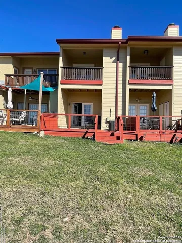 a view of a cafe with a table and chairs