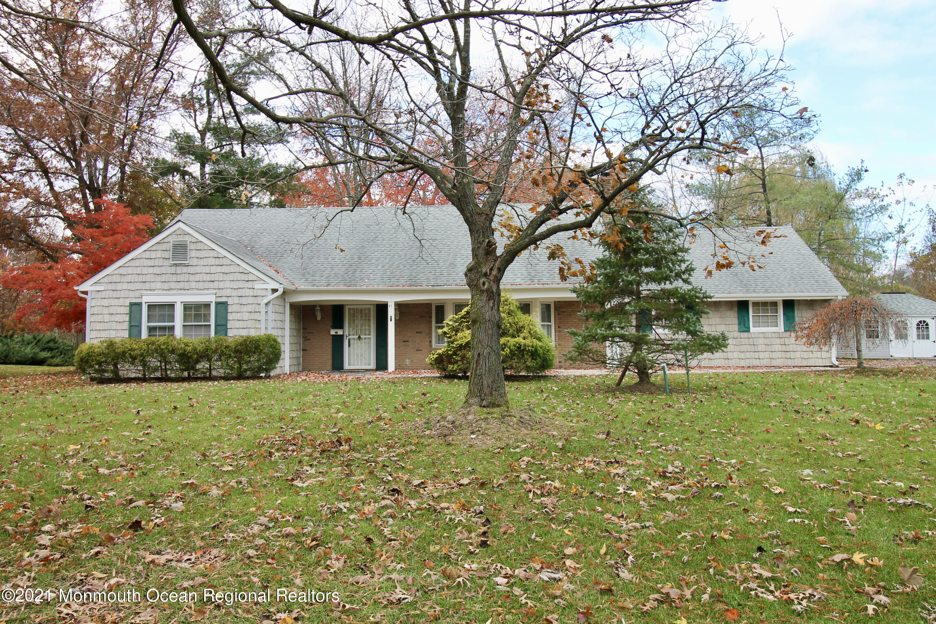 61 Crosswicks Road Freehold, NJ 07728 - Photo 1 of 43 a front view of a house with garden