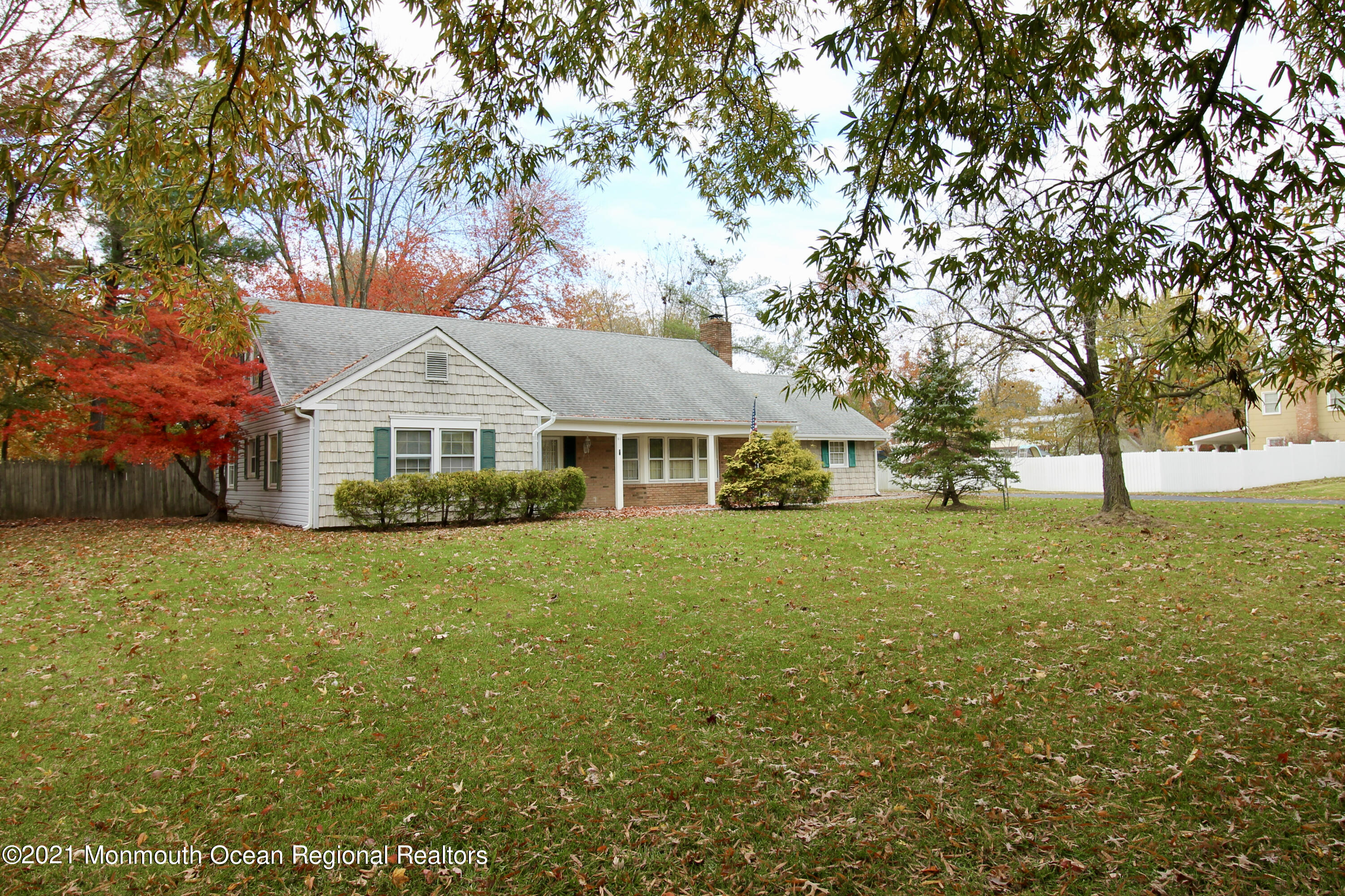 61 Crosswicks Road Freehold, NJ 07728 - Photo 3 of 43 a front view of a house with a garden