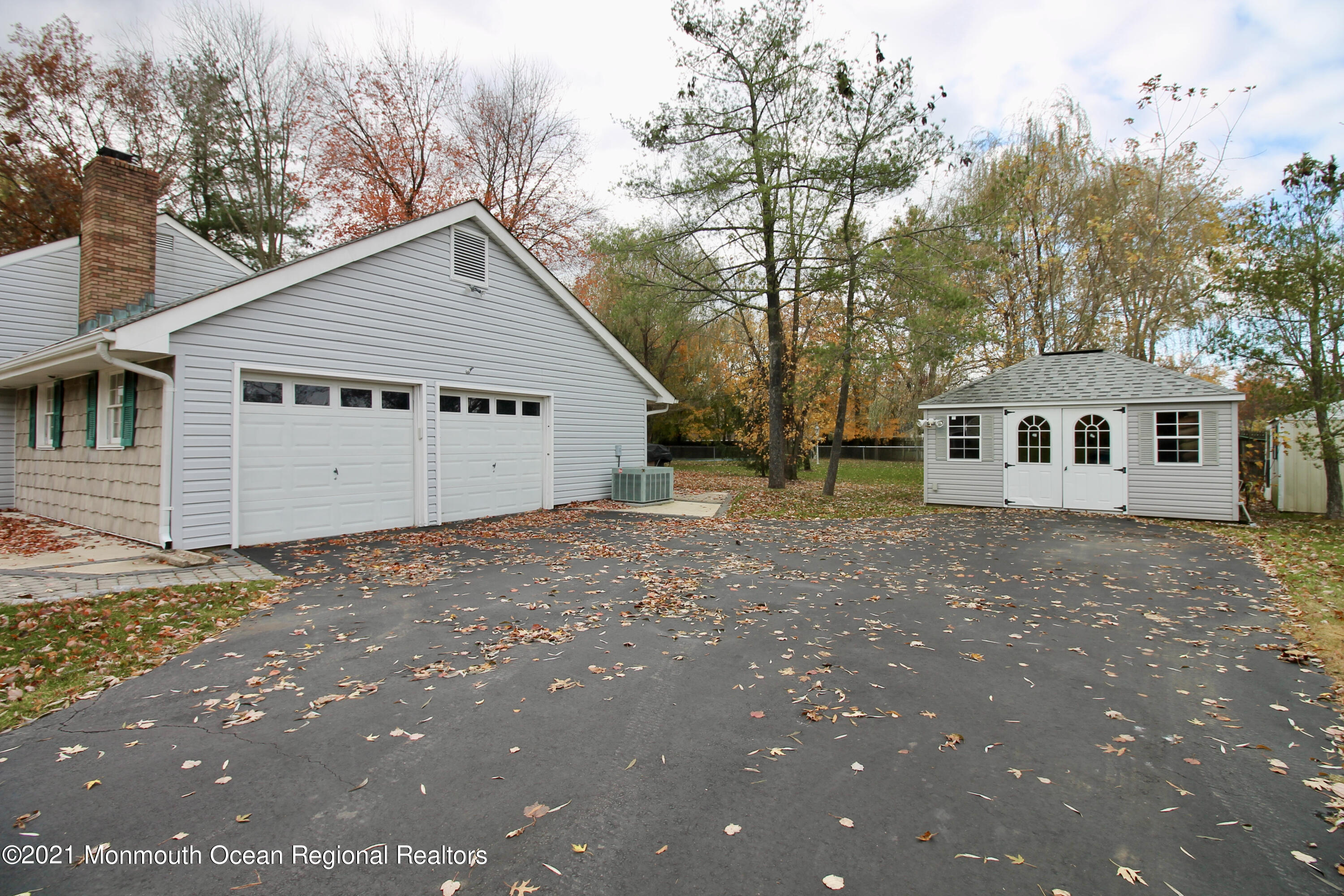 61 Crosswicks Road Freehold, NJ 07728 - Photo 6 of 43 a view of a house with a yard