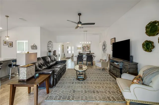 a kitchen with a stove a sink and a refrigerator