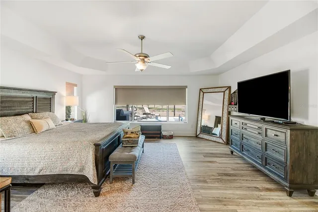 a view of a livingroom with furniture and windows