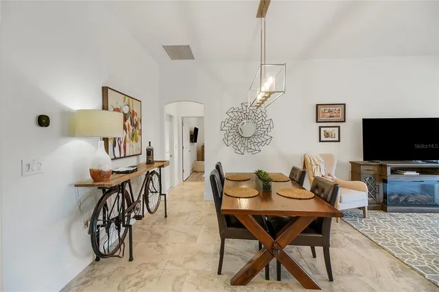 a view of parking garage with cars parked