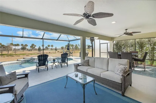 a view of swimming pool with patio