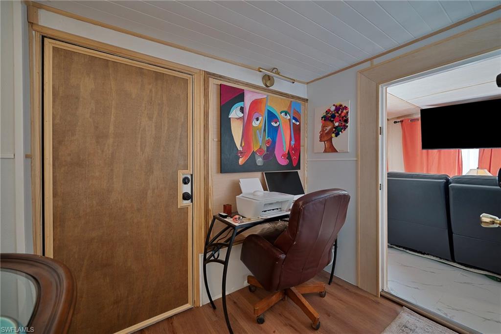 777 Walkerbilt Road, Unit 34 Naples, FL 34110 - Photo 13 of 23 Office area and front door