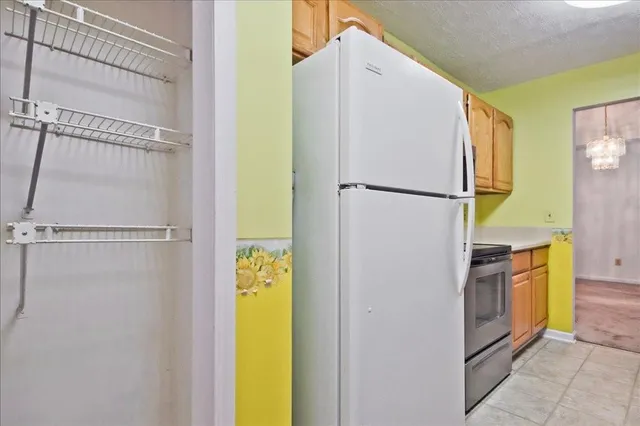 a view of a bathroom with a tub and a shower