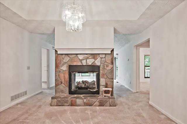 a living room with a fireplace