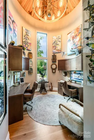 a view of a workspace with furniture