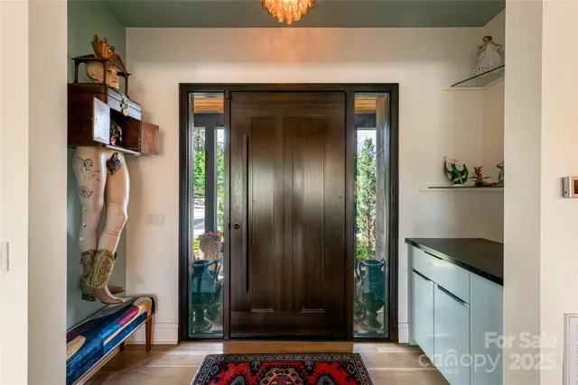 a living room with furniture fireplace and flat screen tv