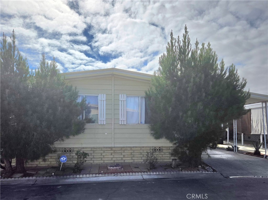 2230 Lake Park Drive, Unit 54 San Jacinto, CA 92583 - Photo 1 of 22 a view of a house with a street