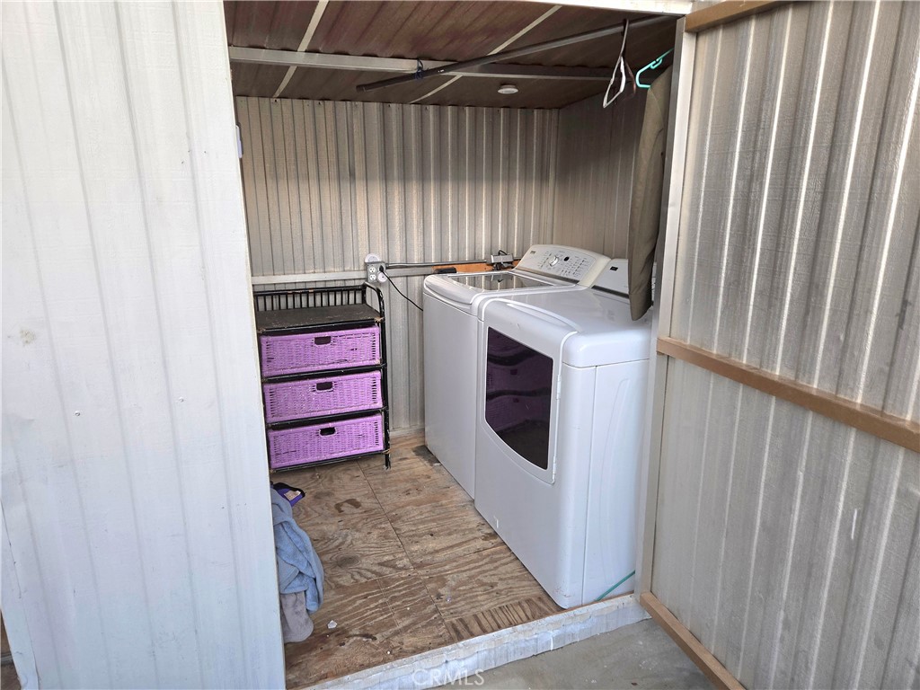 2230 Lake Park Drive, Unit 54 San Jacinto, CA 92583 - Photo 19 of 22 a utility room with dryer and washer