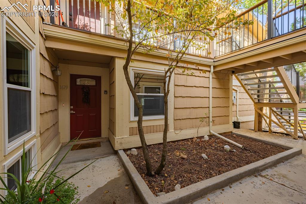 1679 Deer Creek Road Monument, CO 80132 - Photo 1 of 21 Courtyard Entrance