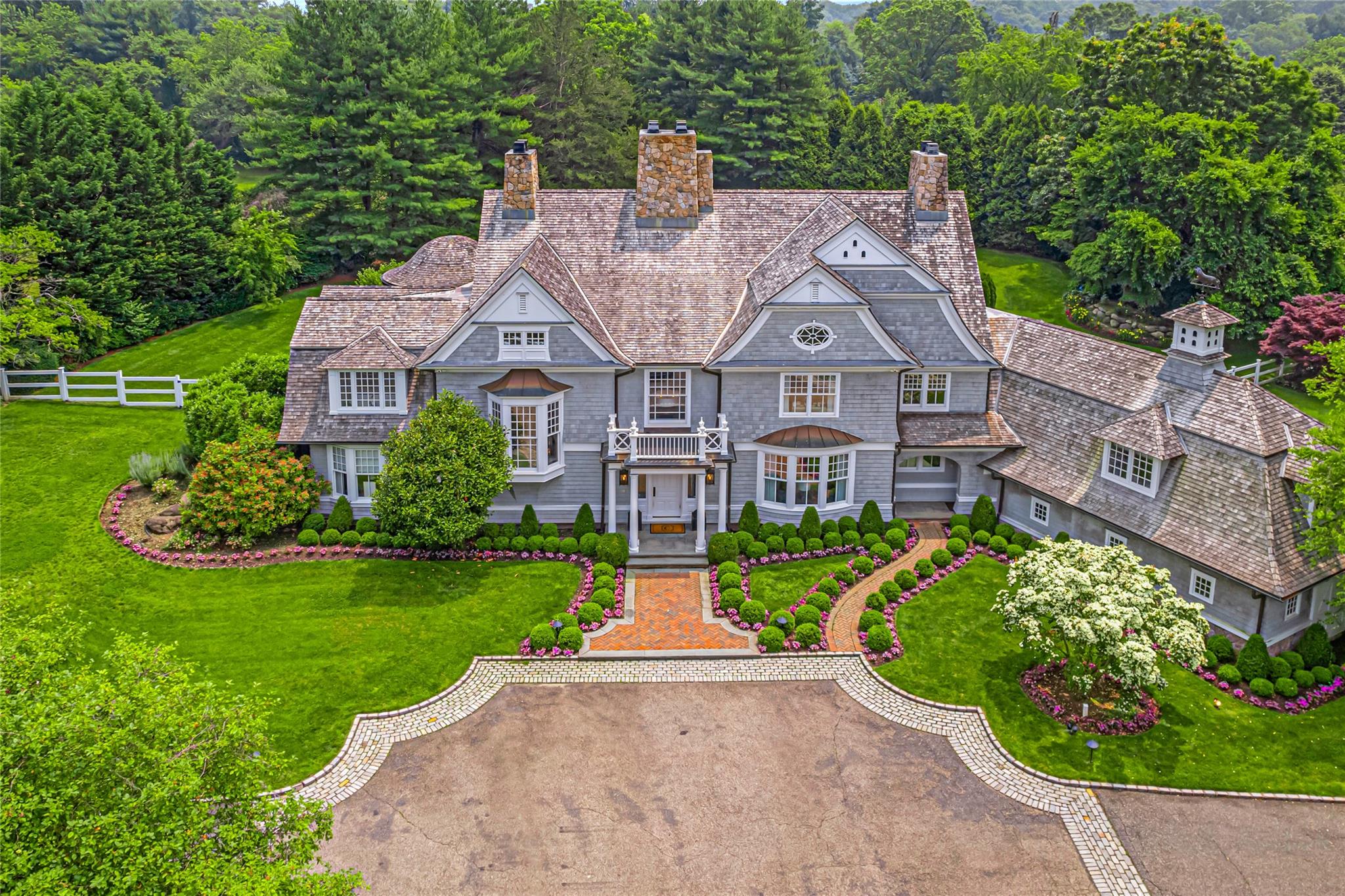 21 Old Wheatley Road Glen Head, NY 11545 - Photo 1 of 1 a front view of a house with a garden