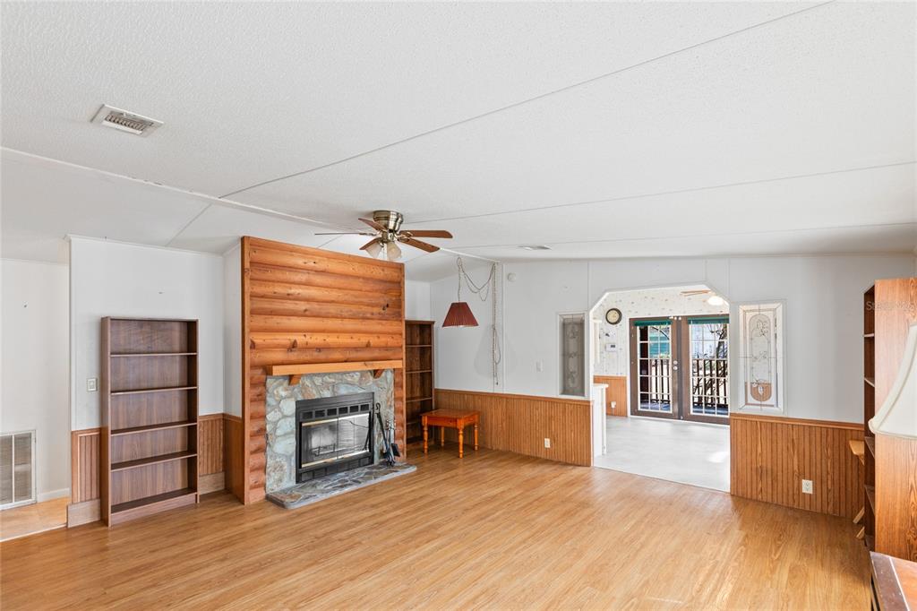 110 Hill Top Loop Hawthorne, FL 32640 - Photo 17 of 52 a view of a livingroom with furniture and a fireplace