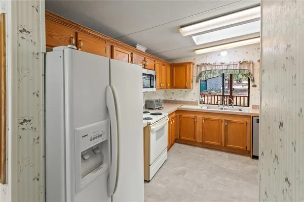 a bathroom with a shower and a sink