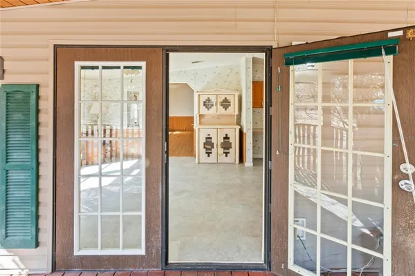 a kitchen with stainless steel appliances a refrigerator sink and cabinets