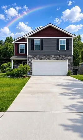 a front view of a house with a yard