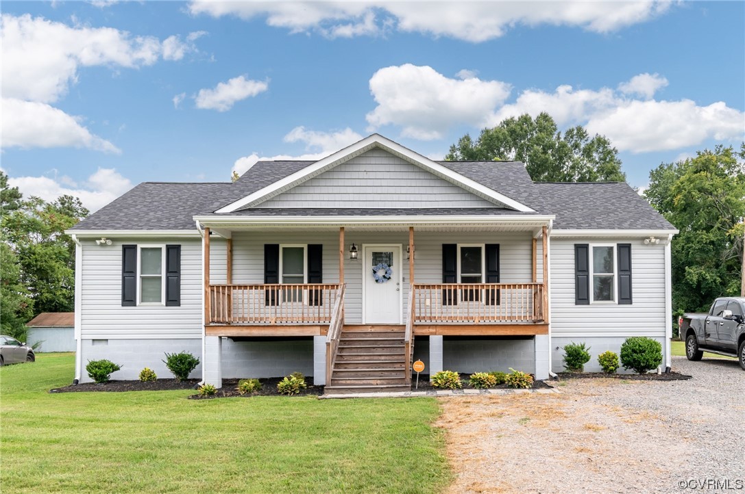 25500 Front Road Petersburg, VA 23803 - Photo 1 of 19 a front view of a house with a yard