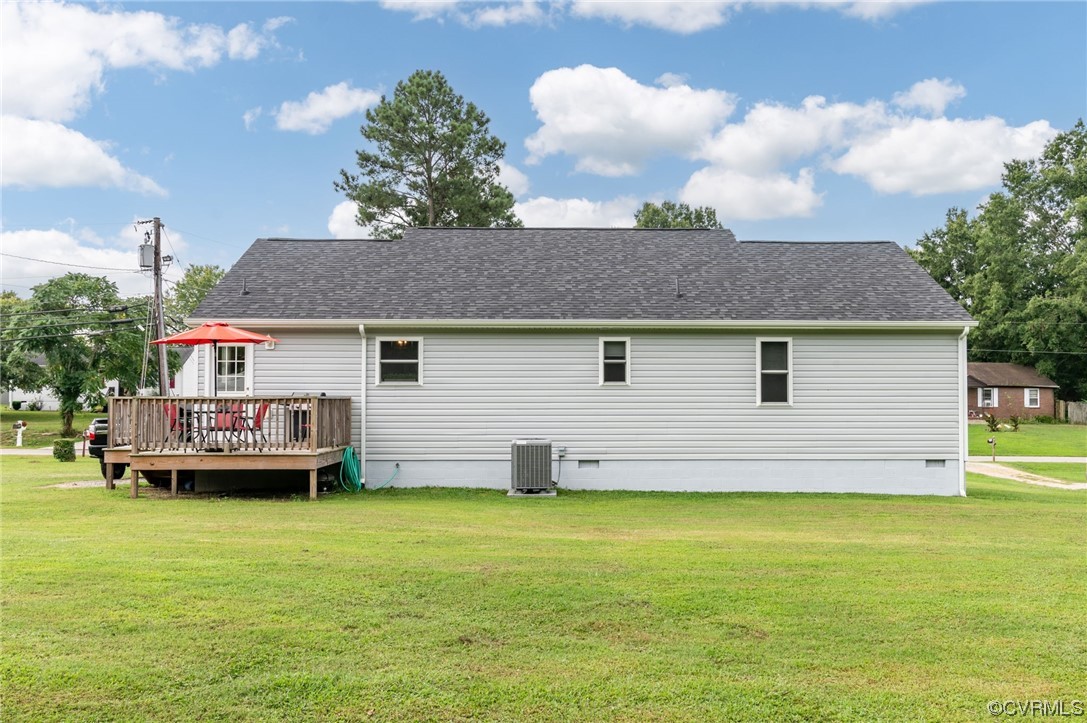 25500 Front Road Petersburg, VA 23803 - Photo 15 of 19 a view of a house with a garden and deck