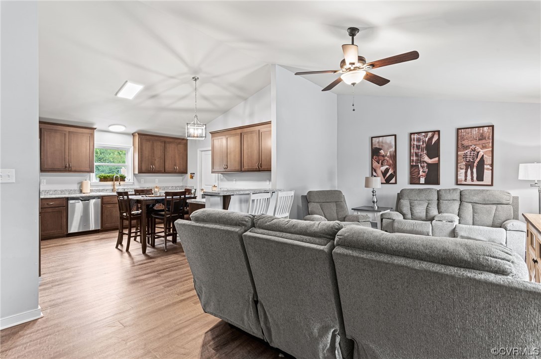 25500 Front Road Petersburg, VA 23803 - Photo 6 of 19 a living room with furniture and kitchen view
