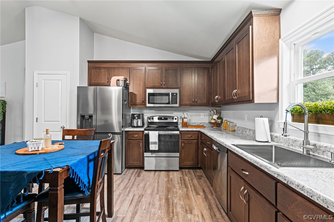 25500 Front Road Petersburg, VA 23803 - Photo 7 of 19 a kitchen with stainless steel appliances granite countertop refrigerator stove top oven microwave and refrigerator