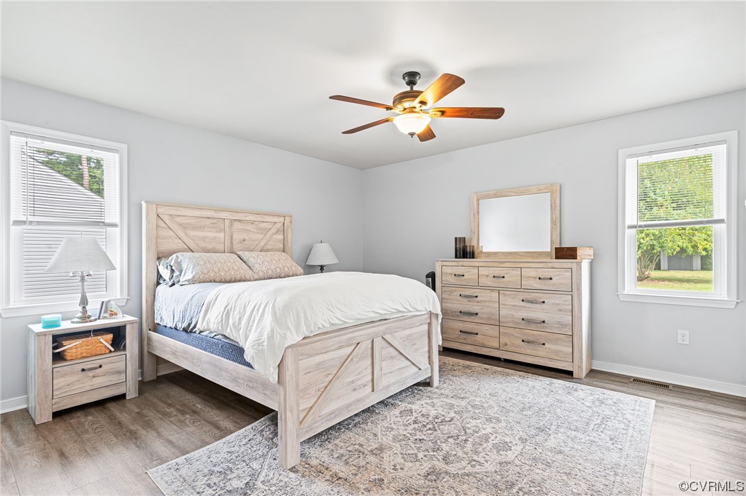 25500 Front Road Petersburg, VA 23803 - Photo 8 of 19 a bedroom with a bed and a window