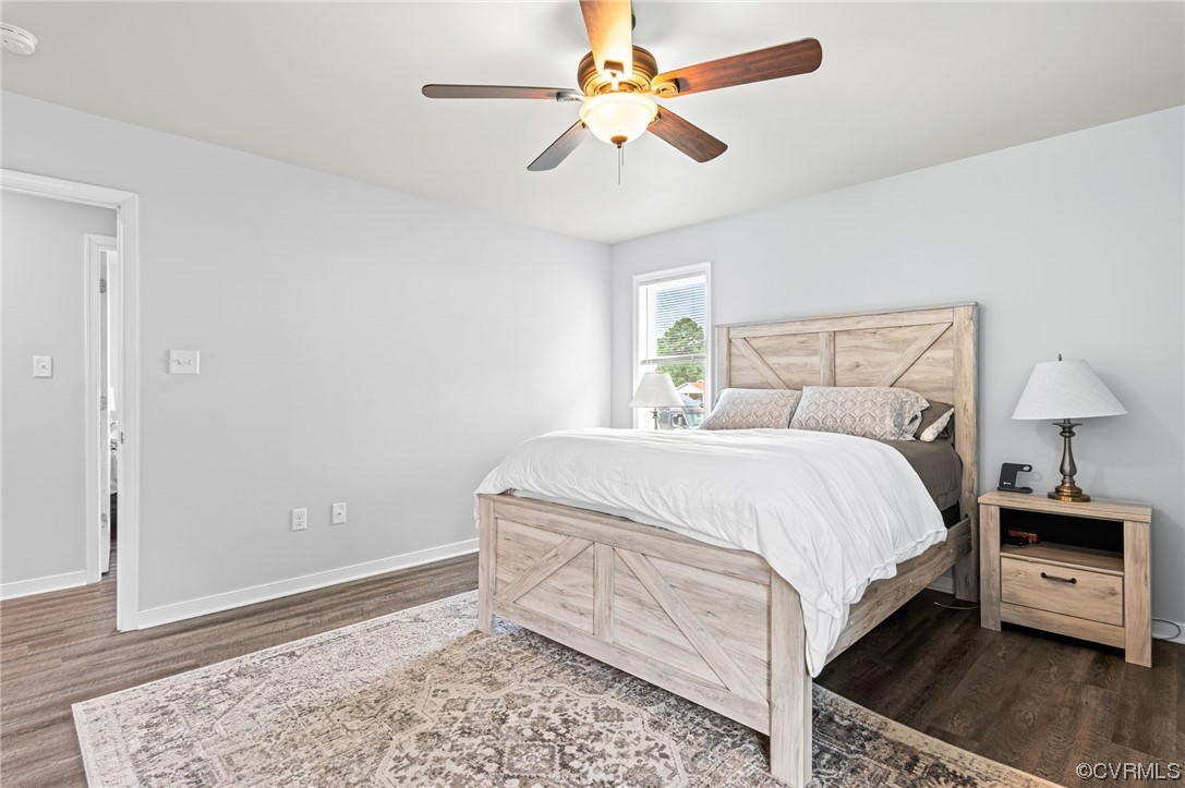 25500 Front Road Petersburg, VA 23803 - Photo 10 of 19 a bedroom with a bed and a ceiling fan