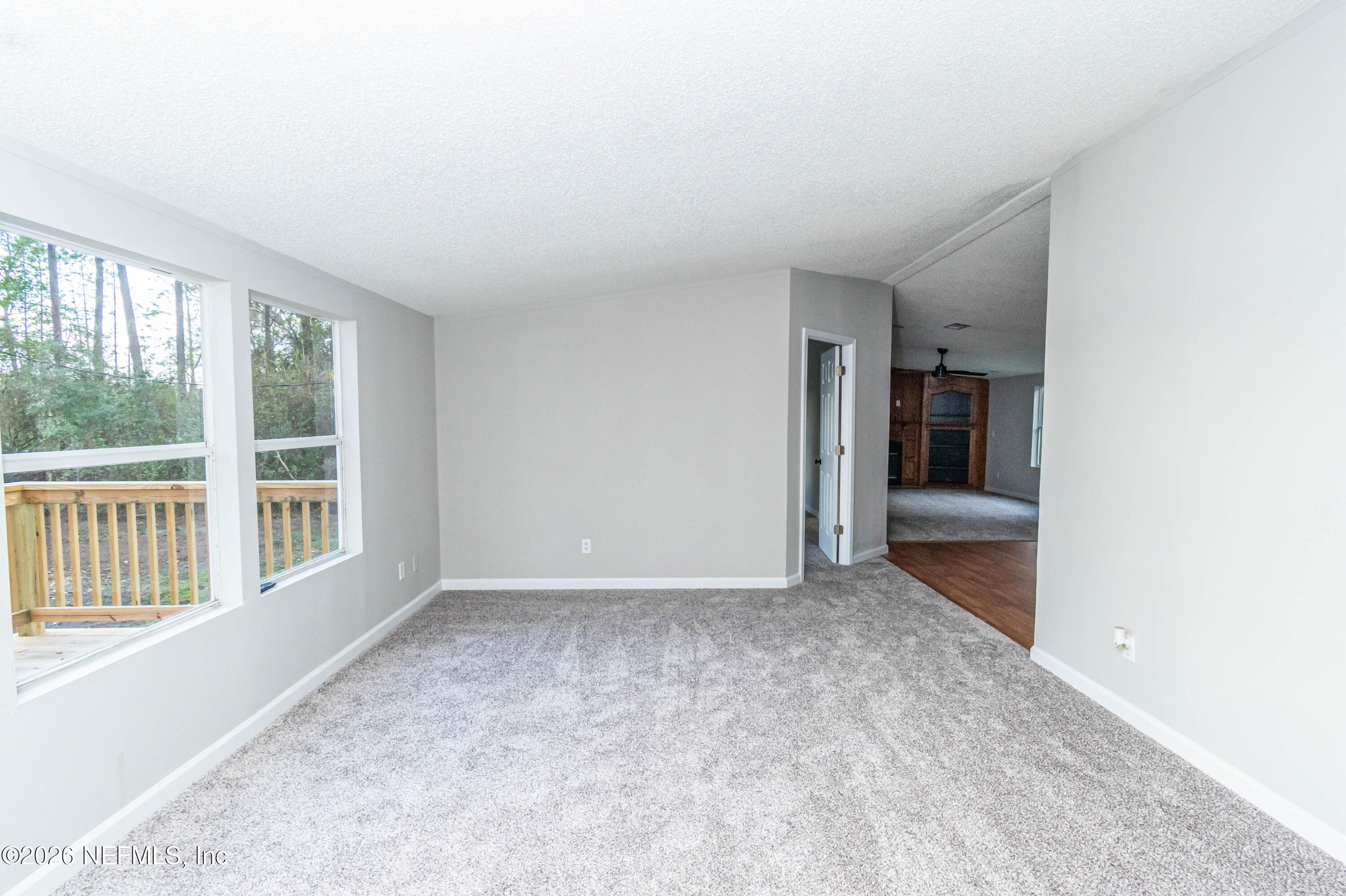 11017 County Road 229 Sanderson, FL 32087 - Photo 14 of 33 a view of an empty room with a window